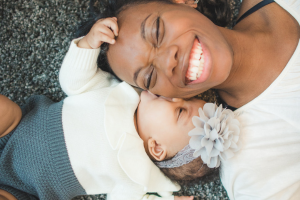 Baby Kissing Mom's Face